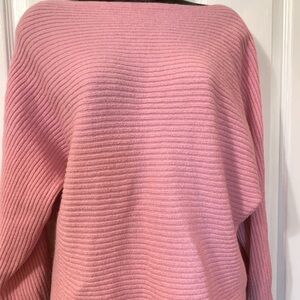 Gently worn Pink sweater. Please see clothing tag for materials make up
